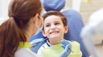 how a pediatric dentist checks a child's bite
